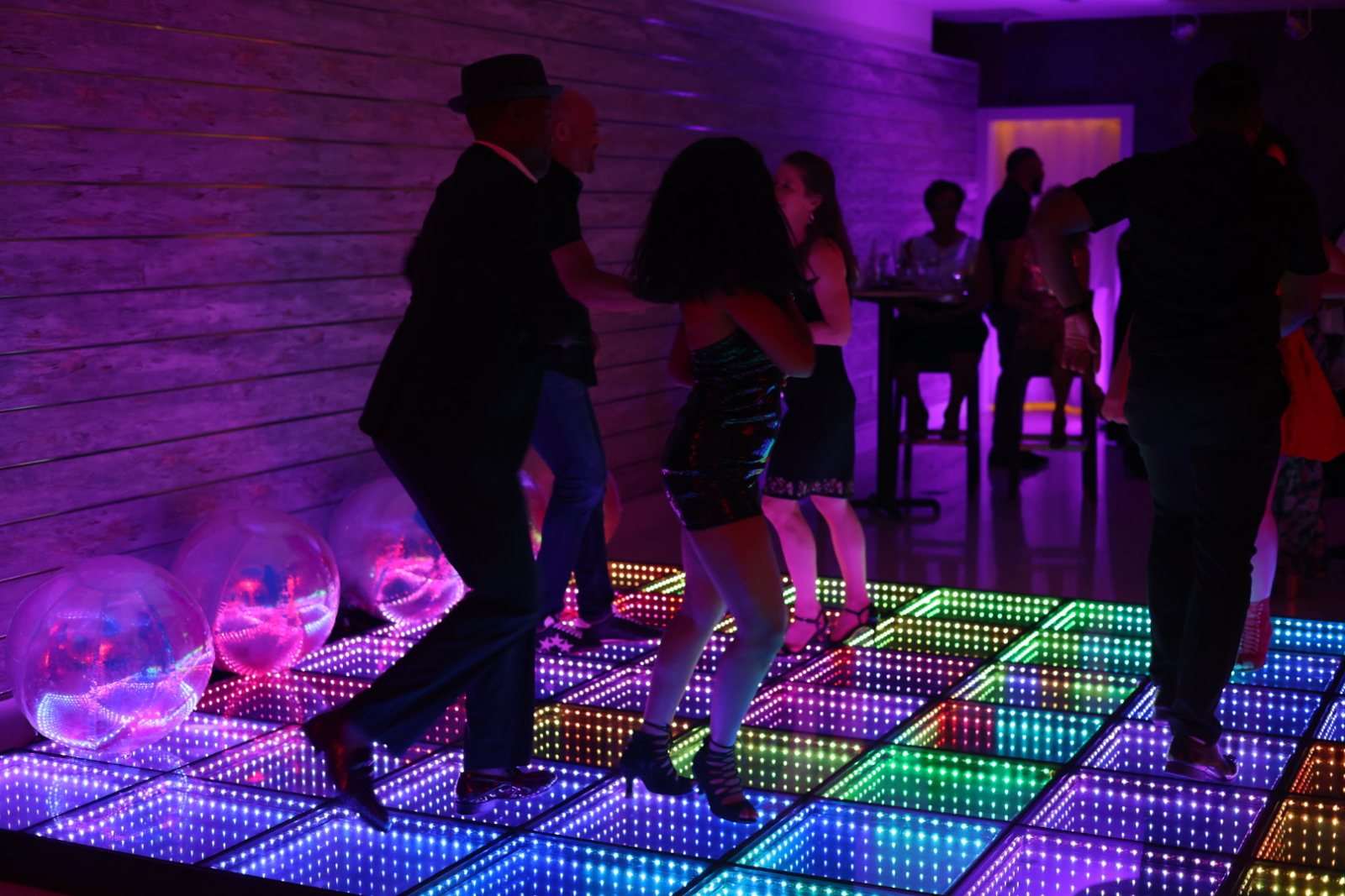 Dancers sharing a lively social dance floor