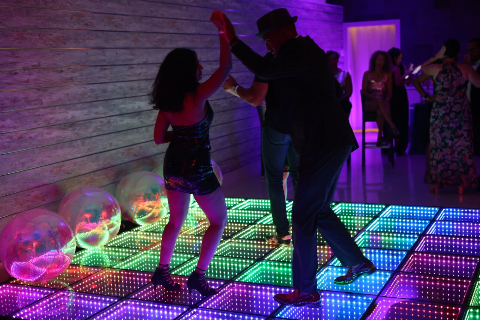 Partners moving through an open-hand turn
