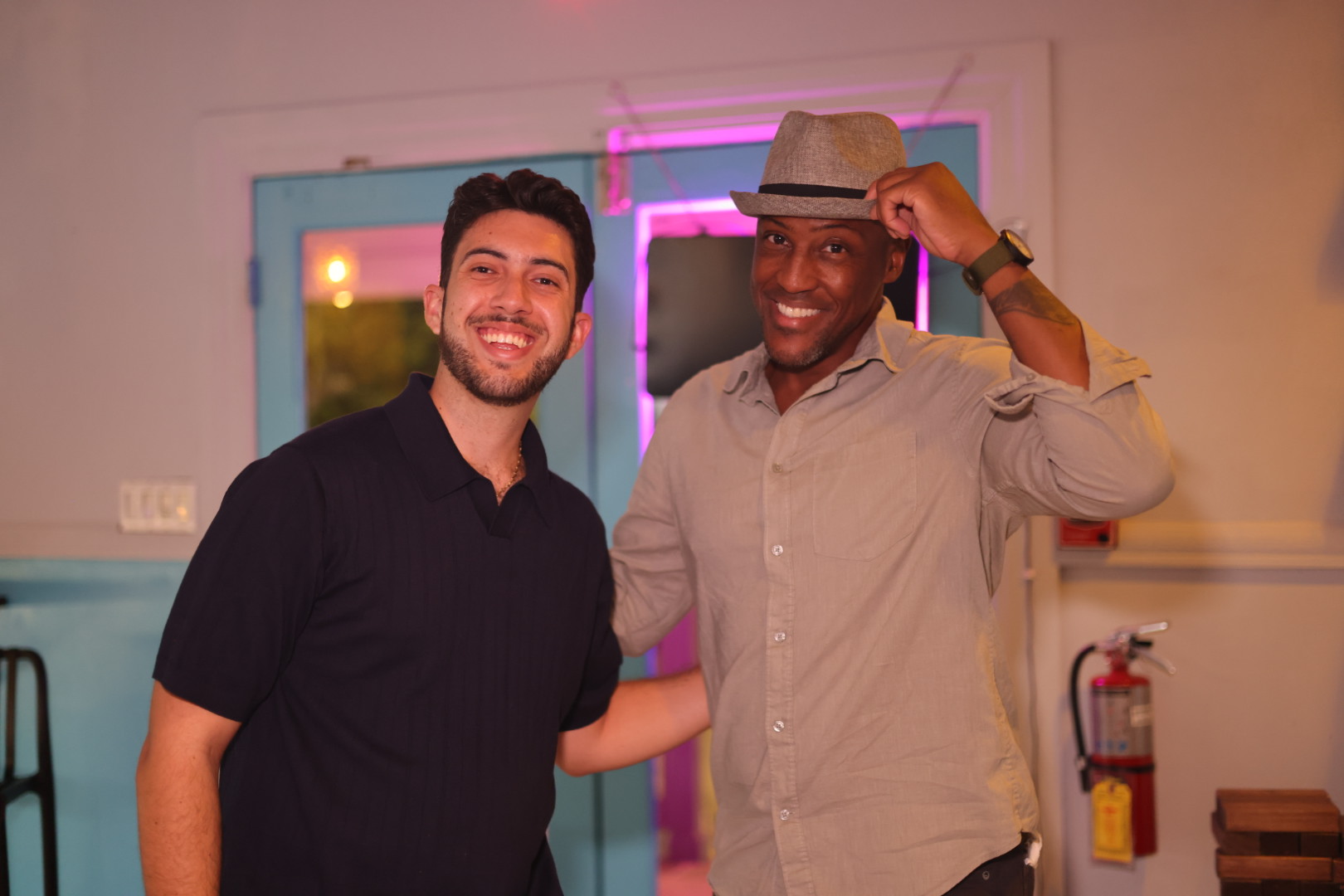 Two guests sharing a smile at Gusto Salsa Social