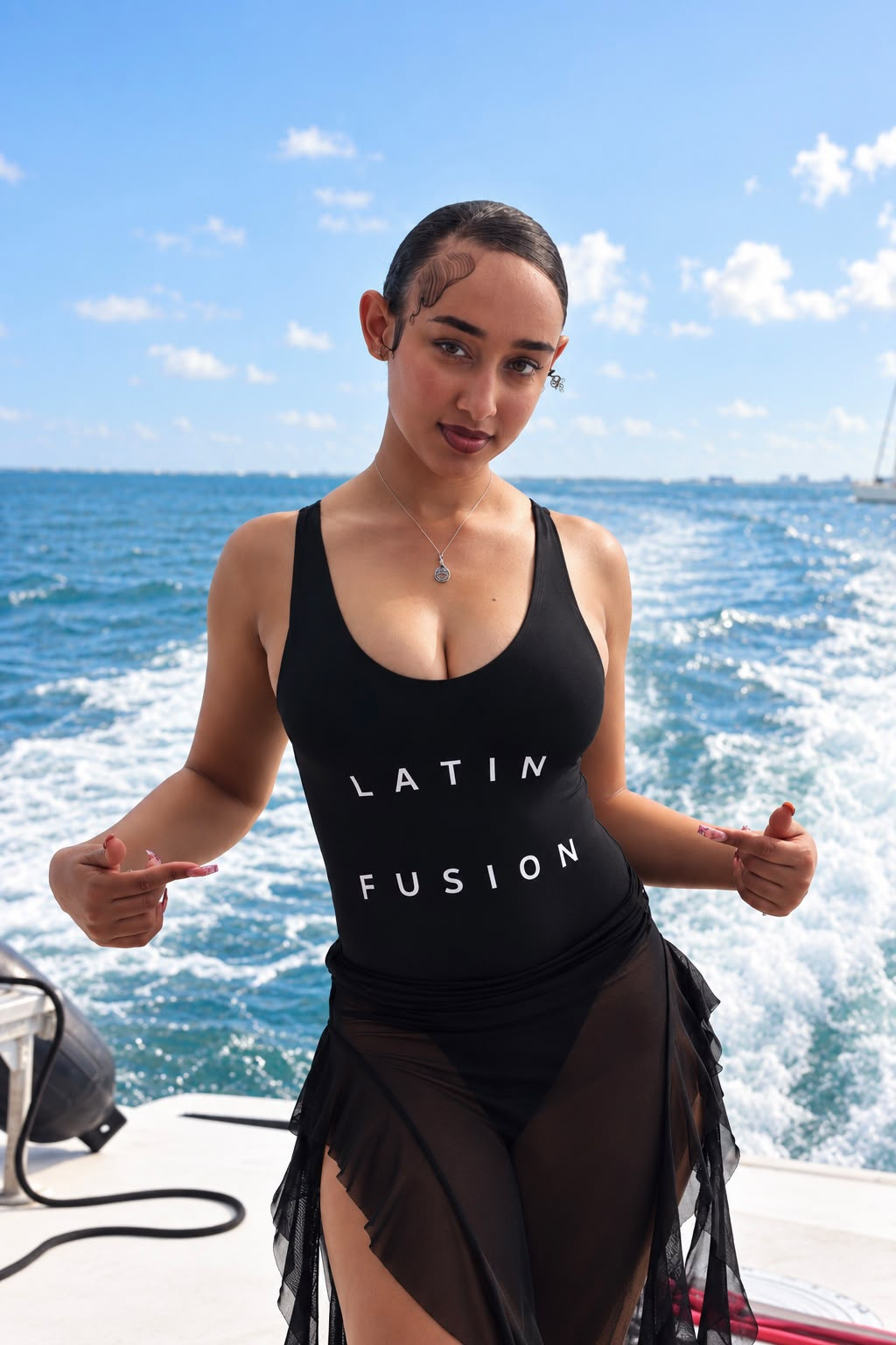 Model wearing the black Latin Fusion Couture Performance Bodysuit, front view