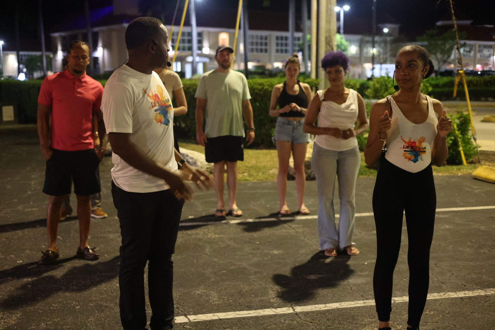 The group learning a new step at Street Salsa