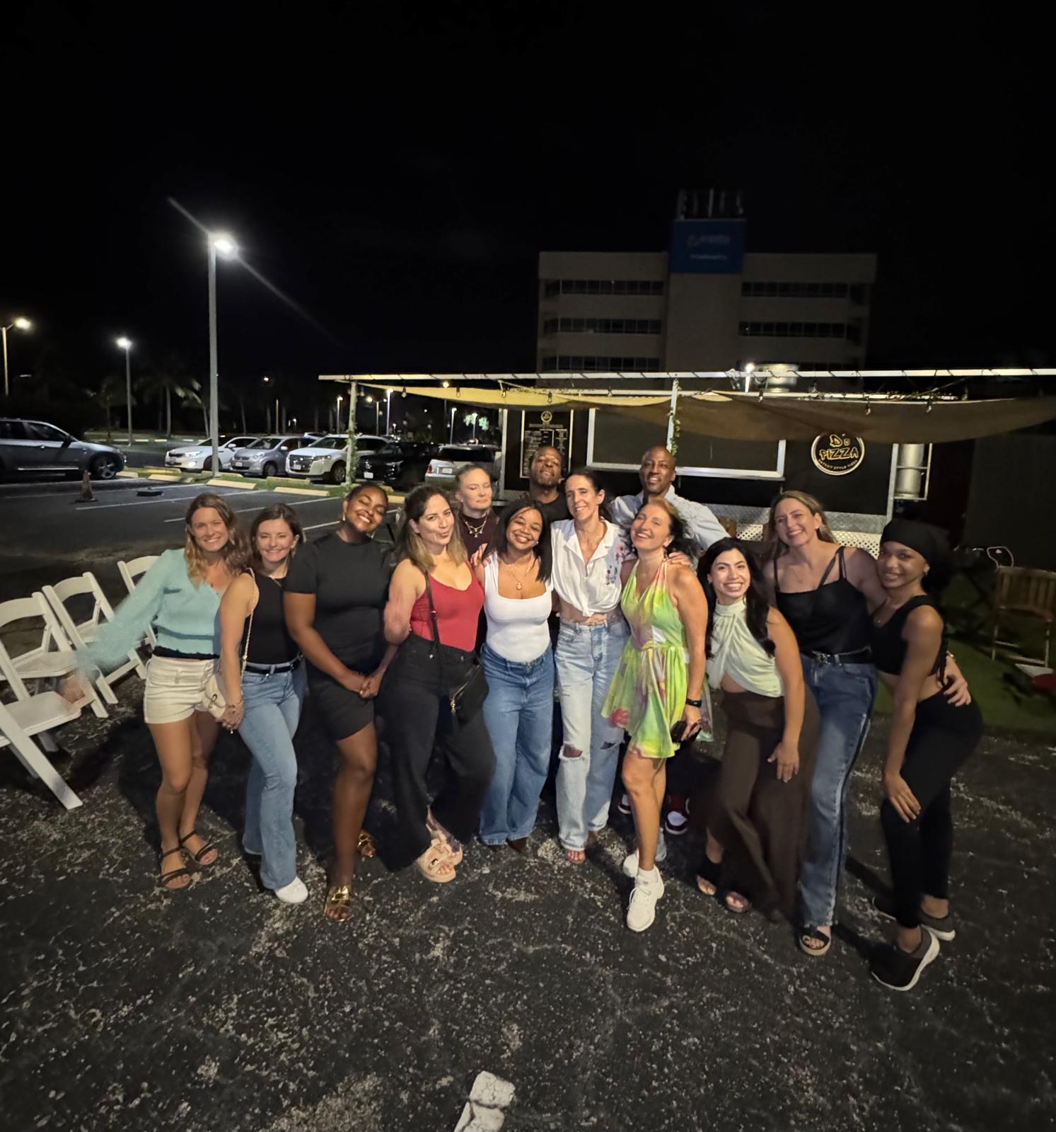 Friends gathering for a group photo at Street Salsa